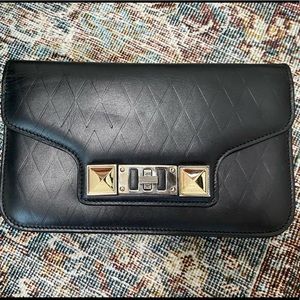 Proenza Schouler black wallet on chain!